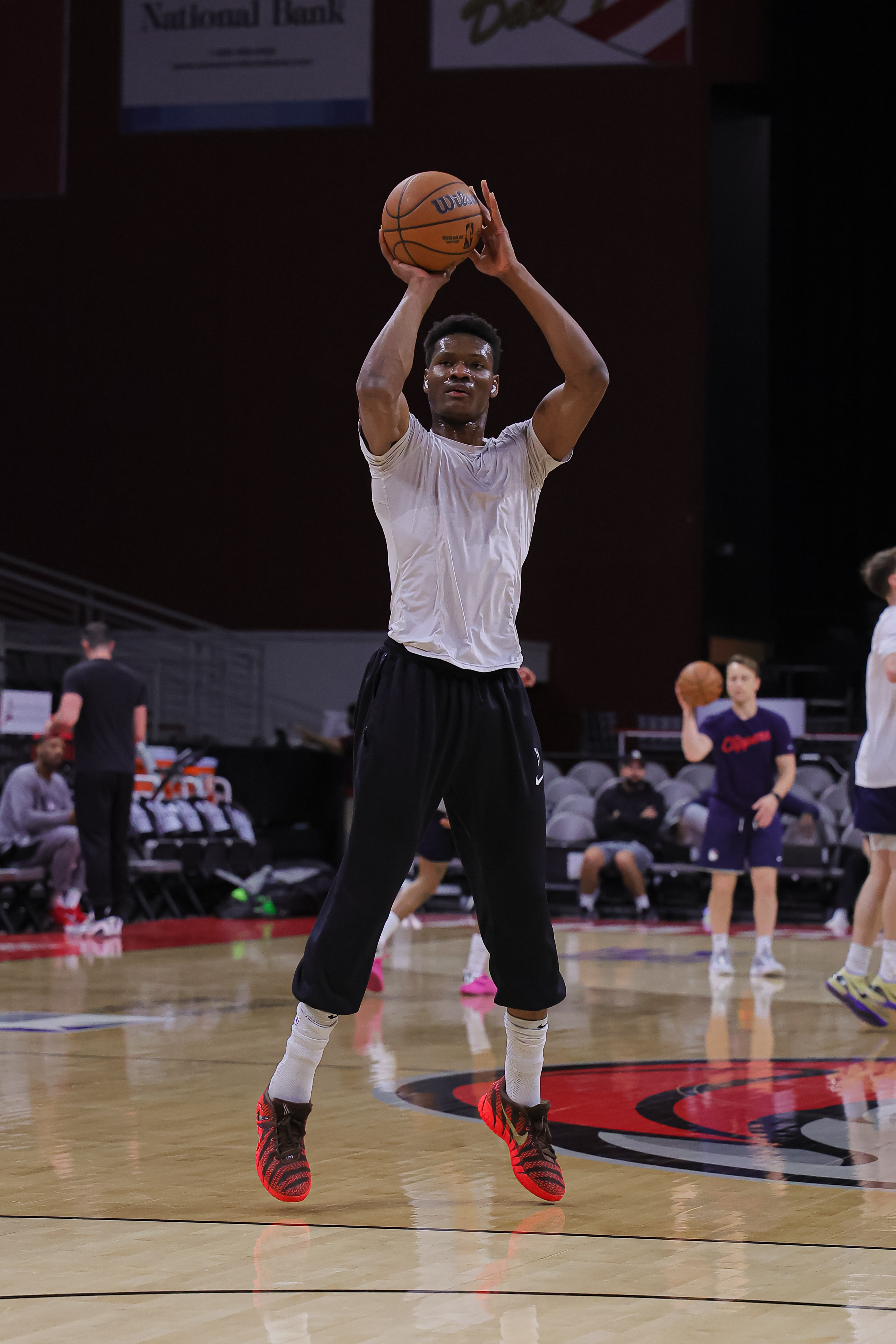 Efemena Abogidi taking a jump shot during basketball warmups